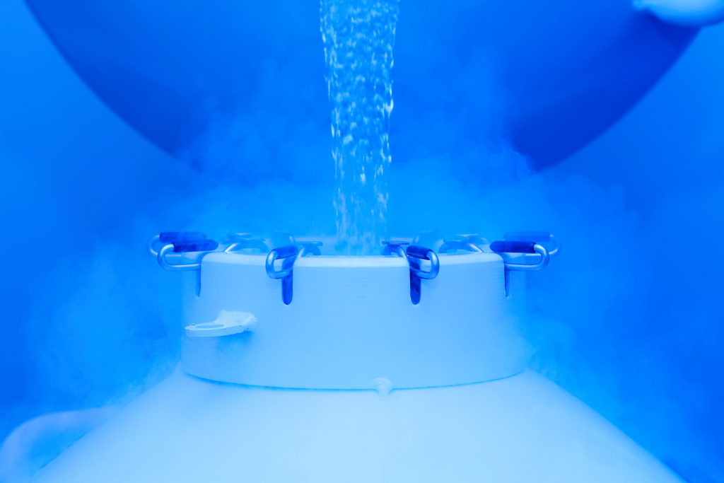 frozen nitrogen being poured into container